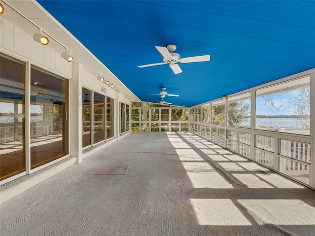 unfurnished sunroom with lofted ceiling