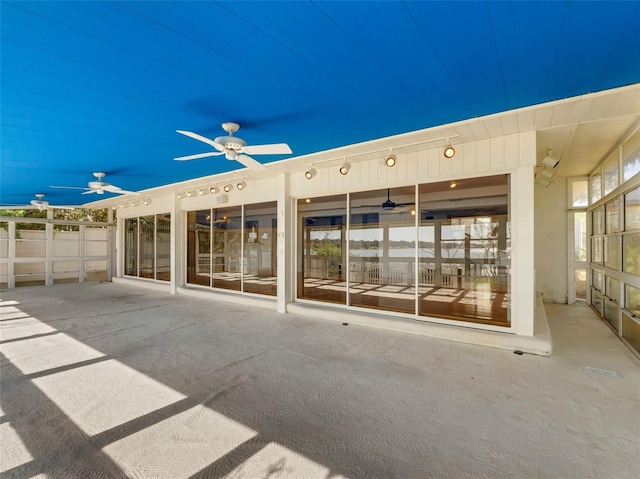 view of patio with ceiling fan