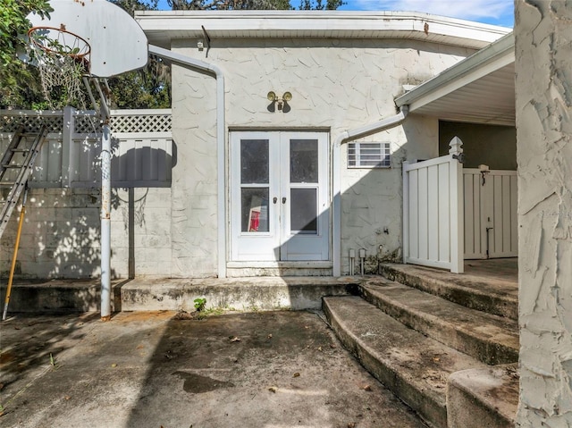 doorway to property featuring french doors