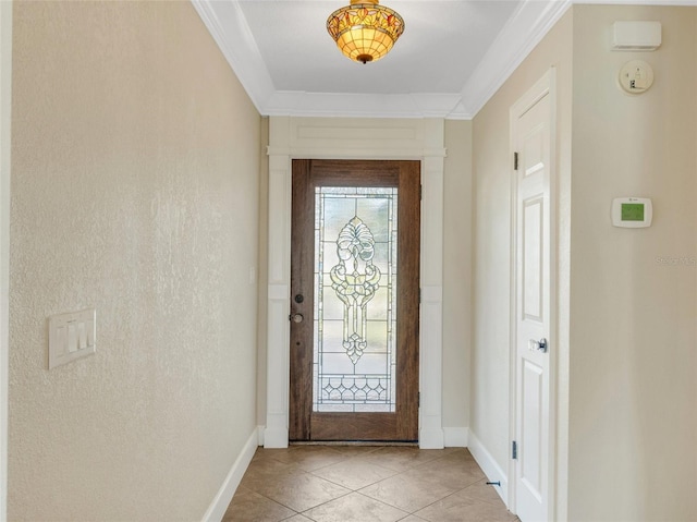 tiled foyer with ornamental molding