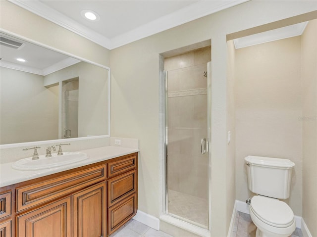 bathroom featuring tile patterned flooring, vanity, toilet, and crown molding