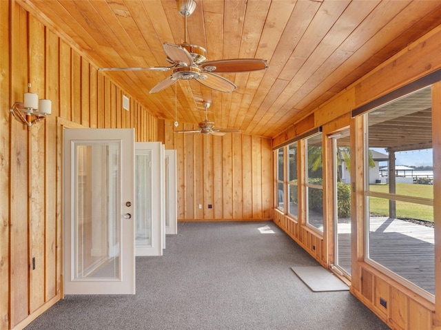 unfurnished sunroom with french doors, lofted ceiling, ceiling fan, and wooden ceiling