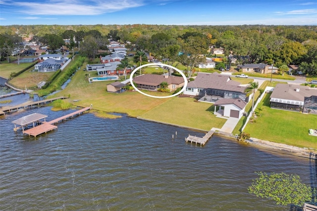 bird's eye view with a water view