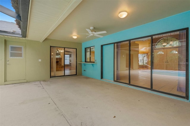 view of patio / terrace featuring ceiling fan