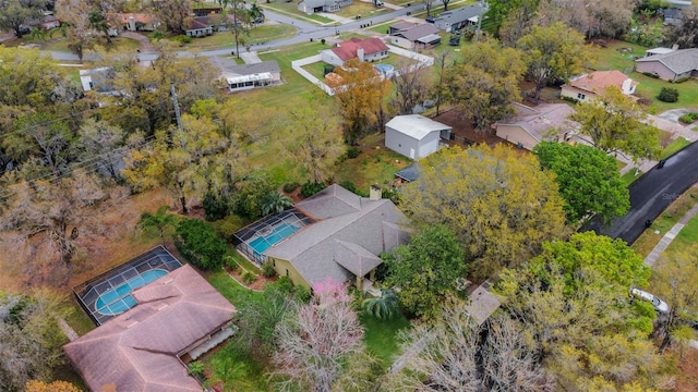 birds eye view of property with a residential view