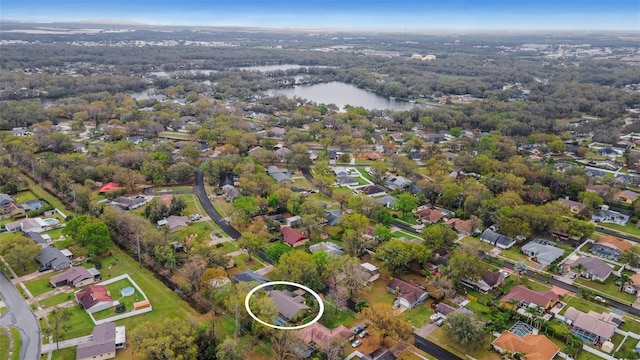 aerial view with a residential view and a water view