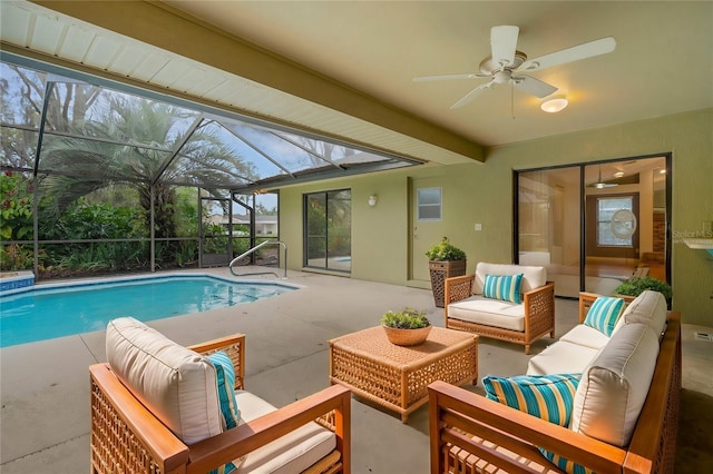 pool featuring a patio, outdoor lounge area, a lanai, and a ceiling fan