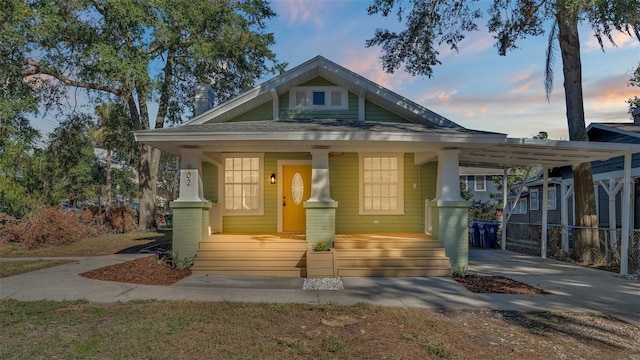 bungalow-style house featuring covered porch