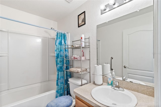 full bathroom with shower / bath combo, toilet, and vanity