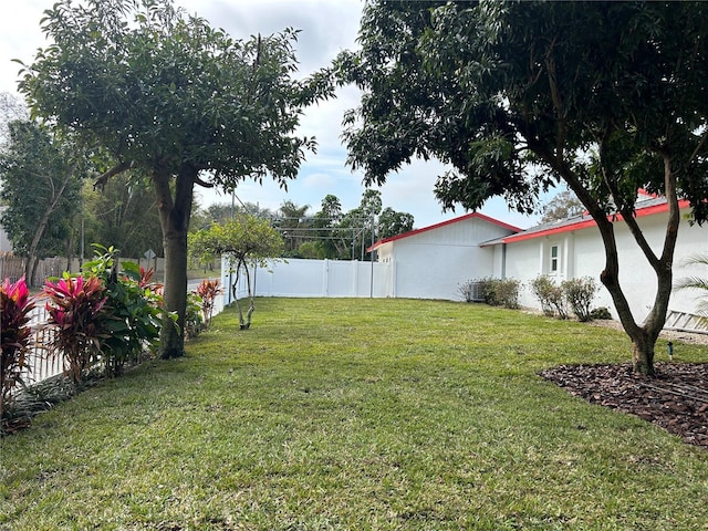 view of yard featuring fence