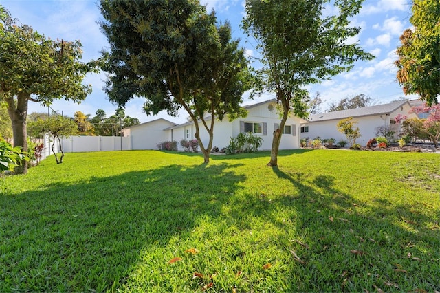 view of yard with fence