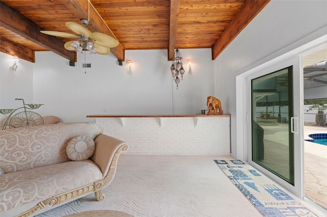 living area featuring wooden ceiling, a ceiling fan, beamed ceiling, and carpet flooring