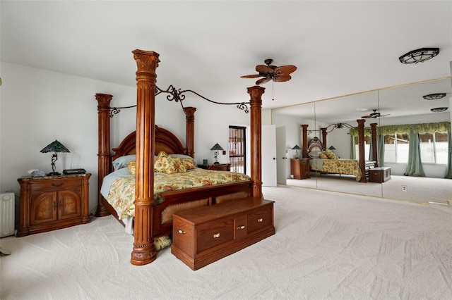 bedroom featuring carpet and radiator