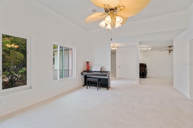 interior space featuring carpet floors and a ceiling fan