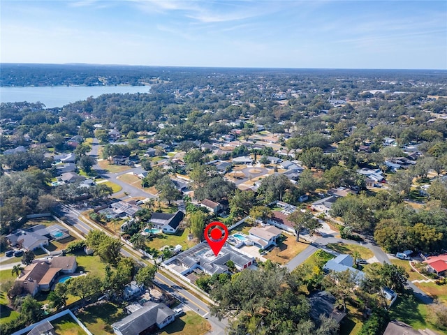 bird's eye view featuring a residential view and a water view