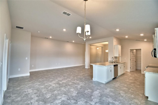 kitchen with sink, dishwasher, hanging light fixtures, white cabinets, and kitchen peninsula