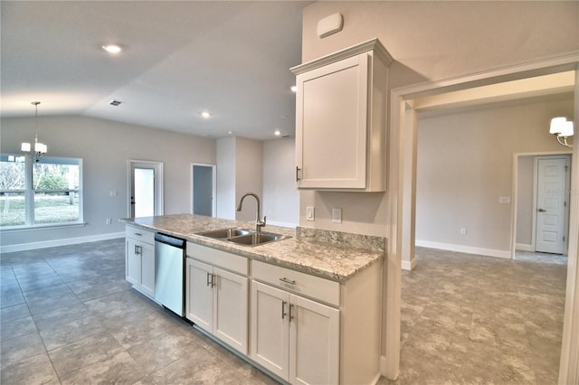 kitchen featuring sink, light stone counters, dishwasher, pendant lighting, and white cabinets