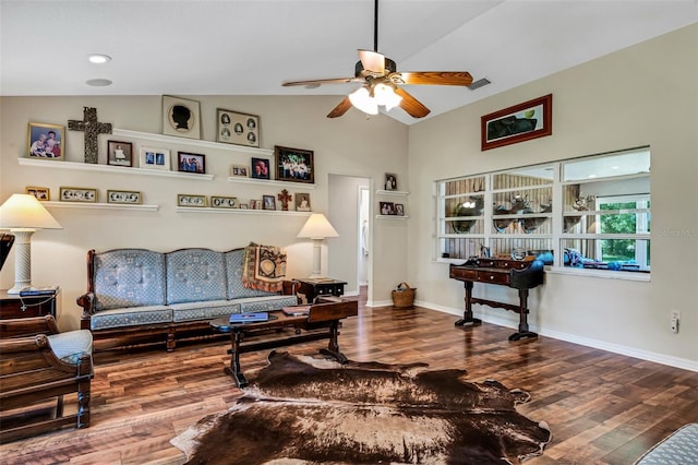 living room with ceiling fan, wood-type flooring, and vaulted ceiling