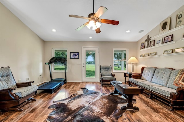 interior space featuring ceiling fan, hardwood / wood-style floors, and lofted ceiling