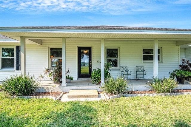 entrance to property with a porch