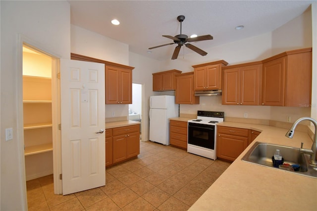 kitchen with ceiling fan, white appliances, sink, and light tile patterned floors