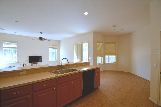 kitchen with light tile patterned floors, black dishwasher, ceiling fan, and sink