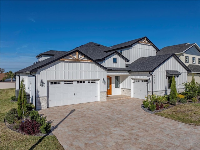 2728 Sunrise Landing Ln, Lakeland, FL 33812 - modern inspired farmhouse with a garage