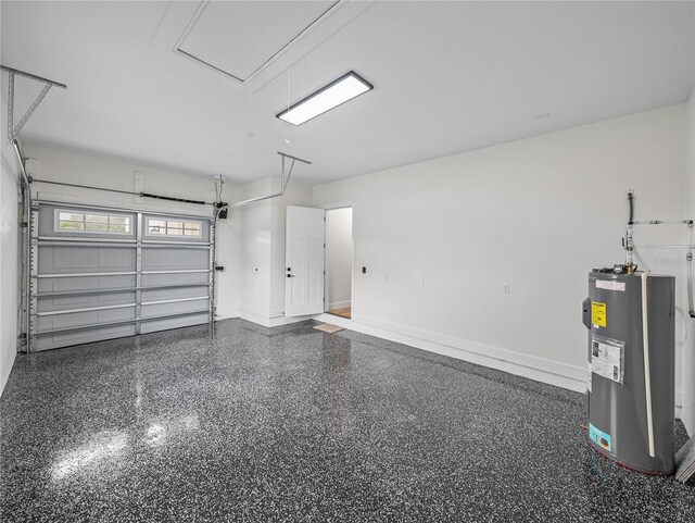 2728 Sunrise Landing Ln, Lakeland, FL 33812 - garage featuring electric water heater and baseboards