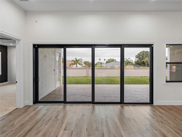 2728 Sunrise Landing Ln, Lakeland, FL 33812 - entryway with wood finished floors and baseboards