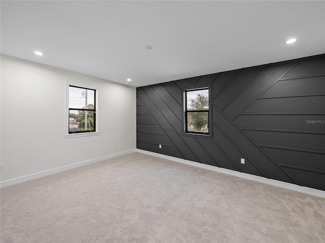 2728 Sunrise Landing Ln, Lakeland, FL 33812 - empty room with baseboards, healthy amount of natural light, recessed lighting, and carpet