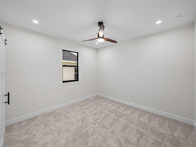 2728 Sunrise Landing Ln, Lakeland, FL 33812 - spare room with a ceiling fan, recessed lighting, light carpet, and baseboards