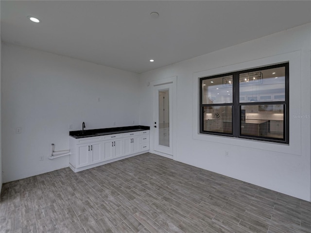 2728 Sunrise Landing Ln, Lakeland, FL 33812 - empty room with light wood-style floors and recessed lighting