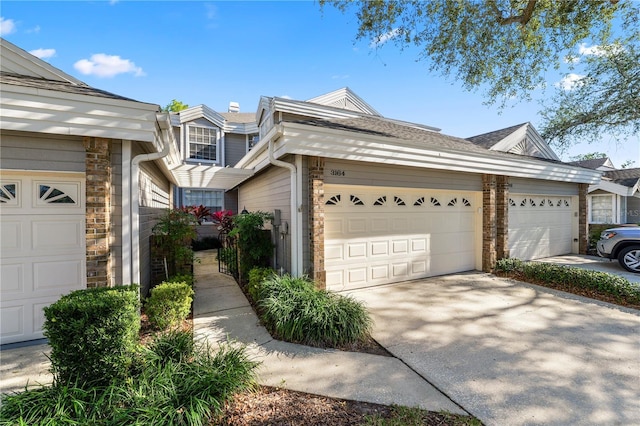 ranch-style home featuring a garage