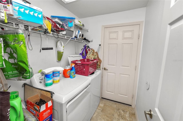 laundry area with independent washer and dryer