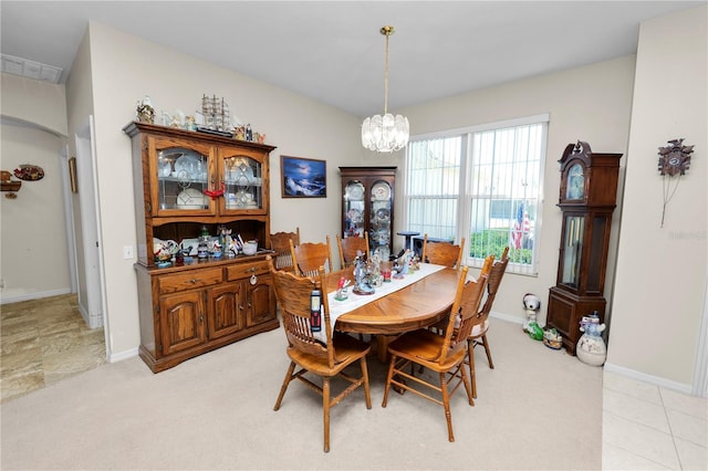 dining room with a chandelier