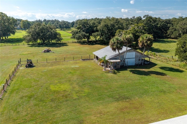 birds eye view of property with a rural view