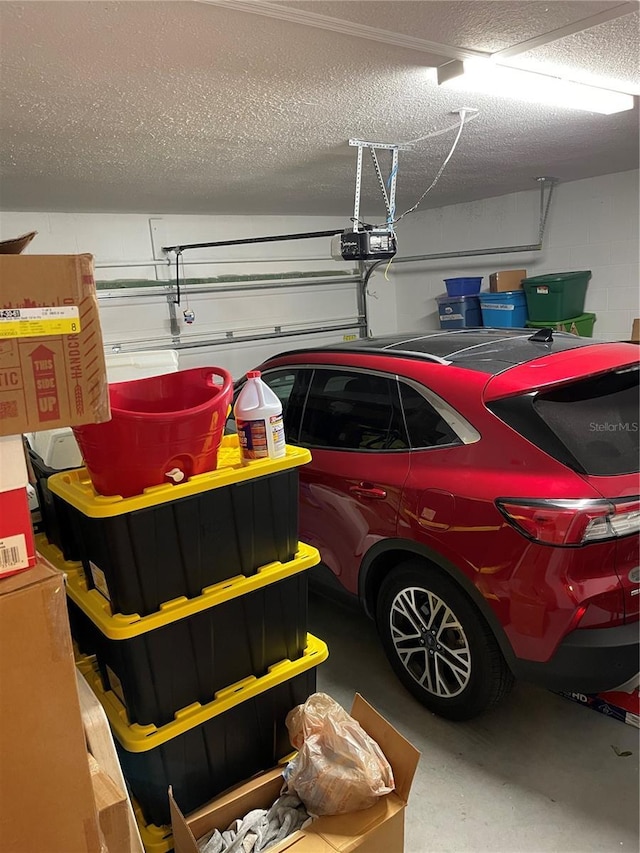 garage featuring a garage door opener