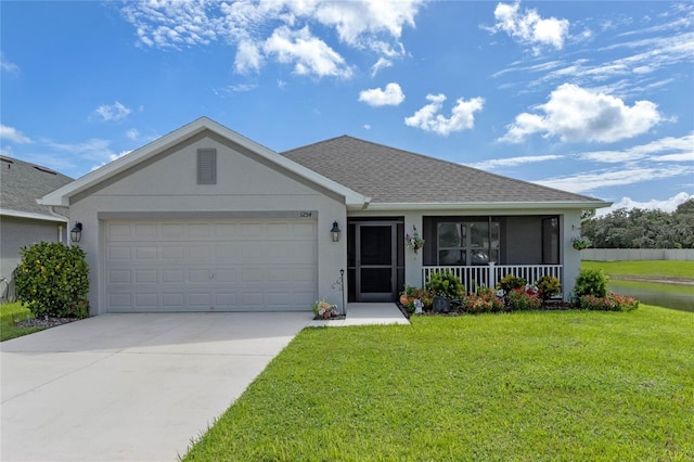 single story home with a porch, a garage, and a front lawn