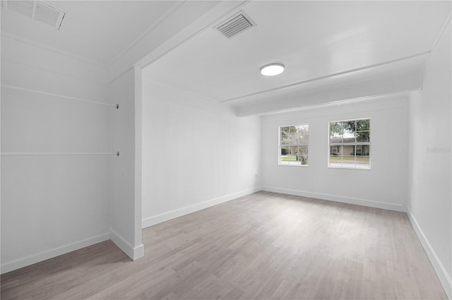 bonus room with light hardwood / wood-style flooring