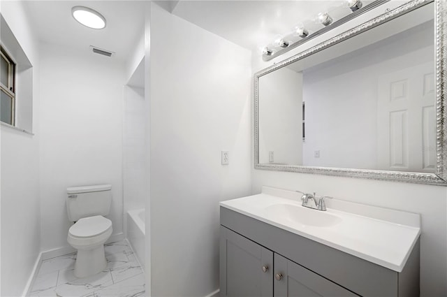 full bathroom with washtub / shower combination, vanity, and toilet