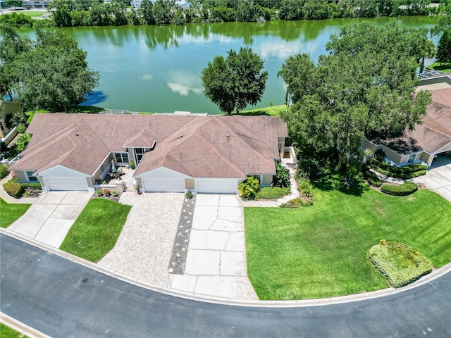 drone / aerial view featuring a water view