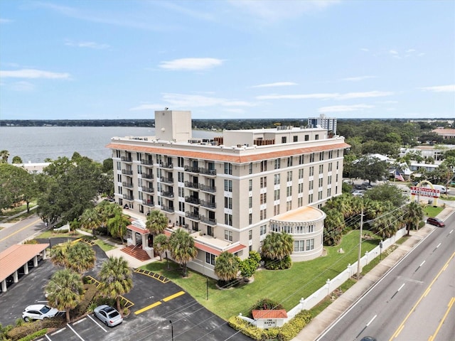 birds eye view of property featuring a water view