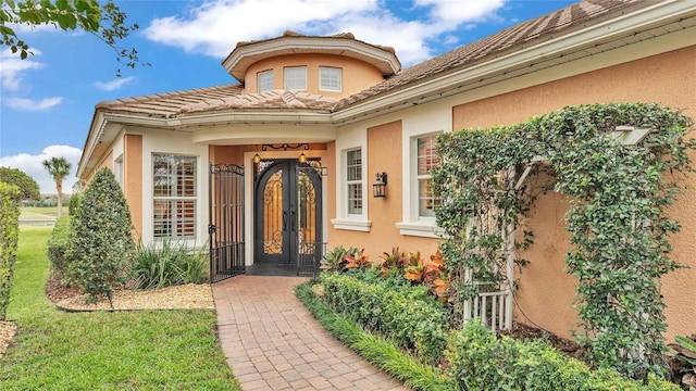 entrance to property featuring central AC