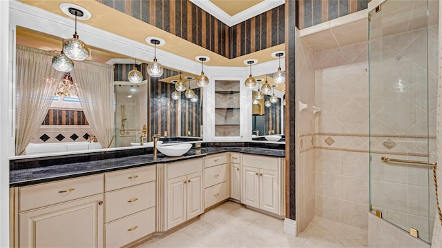 bathroom featuring vanity, crown molding, and tiled shower