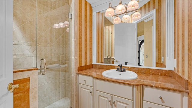 bathroom with vanity and an enclosed shower