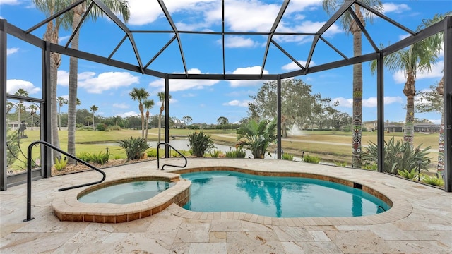 view of swimming pool featuring a patio area, an in ground hot tub, and glass enclosure