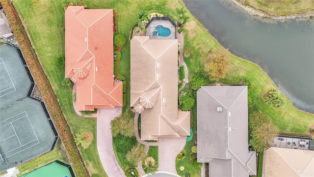 birds eye view of property featuring a water view