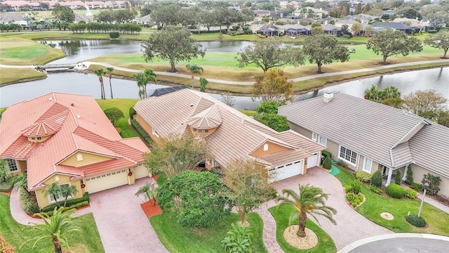 drone / aerial view with a water view