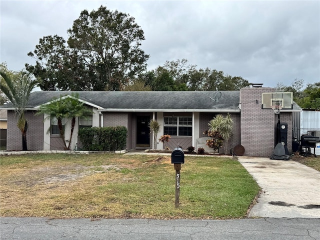 view of front of home with a front lawn