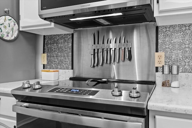 kitchen featuring white cabinetry